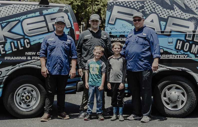 Parker home service family standing in front of their company vans