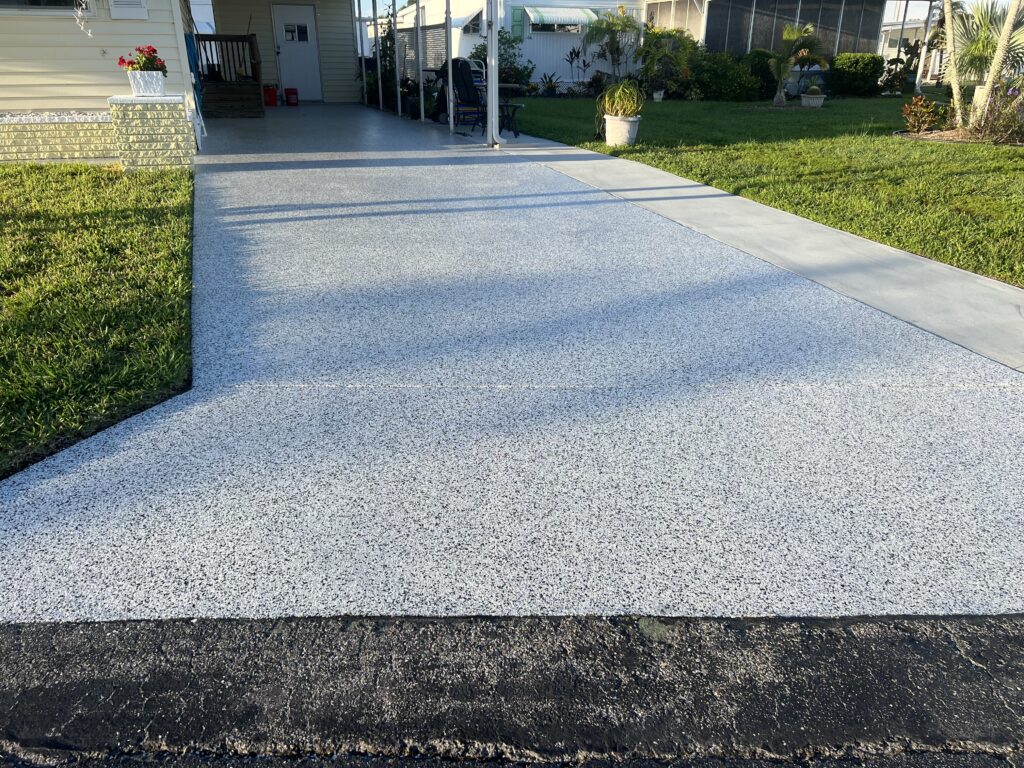 View of an epoxy floor driveway from the road.