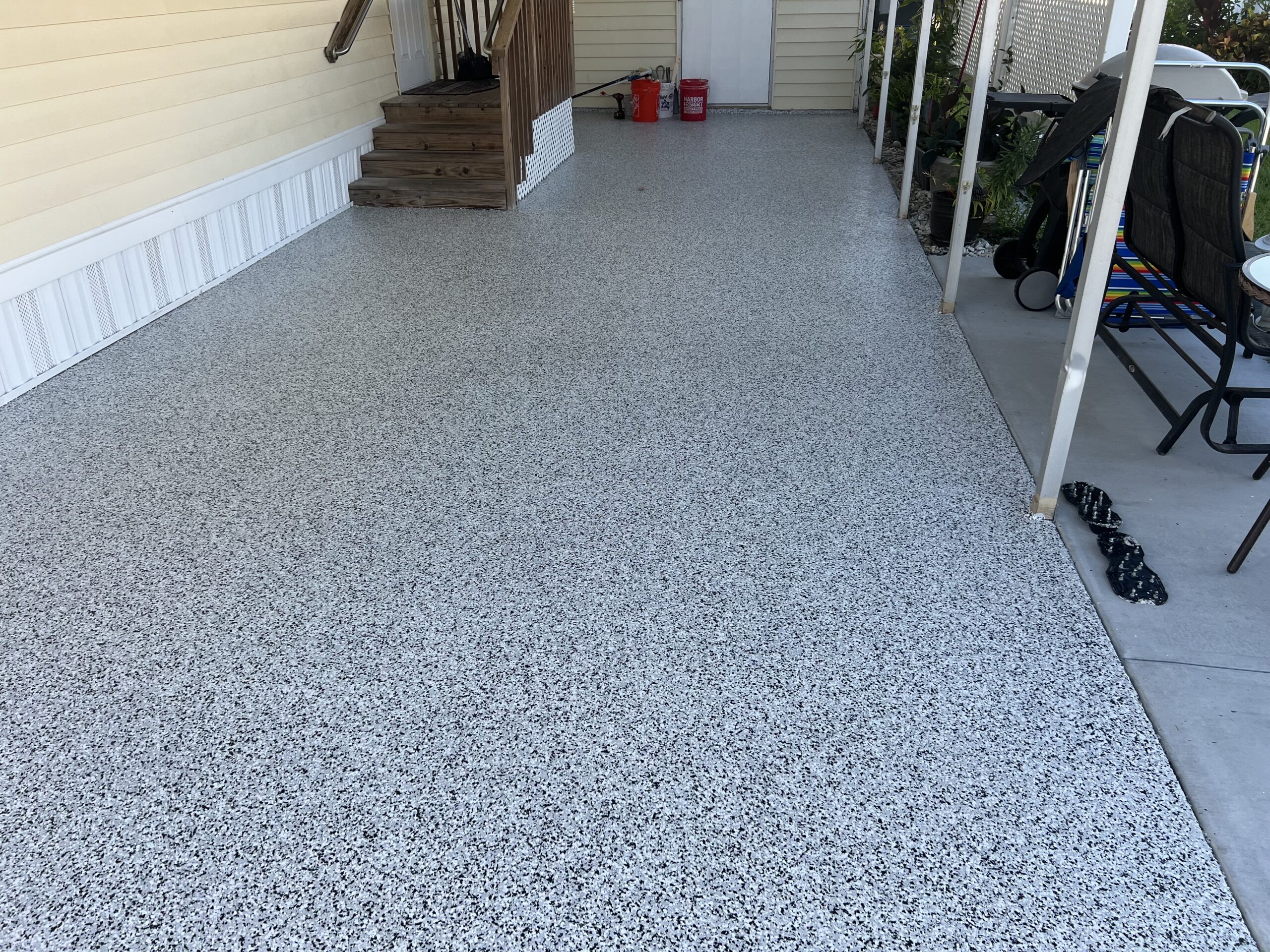 Beautiful epoxy flooring leading to the door.